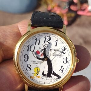 - Armitron Gold and Black Sylvester & Tweety Men's Watch NWOT
